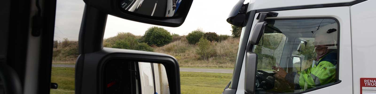 Een chauffeur van Melle Transport aan het werk in de cabine